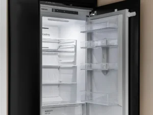 Refrigerator open for inspection with interior light on