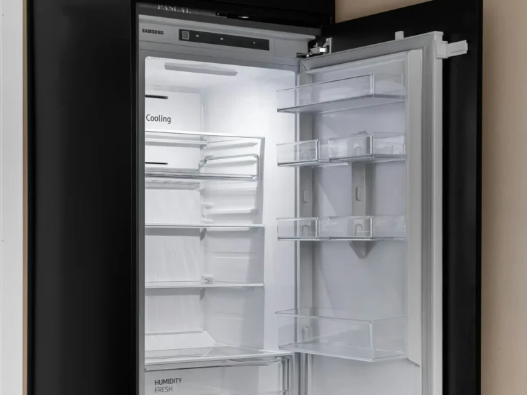 Refrigerator open for inspection with interior light on