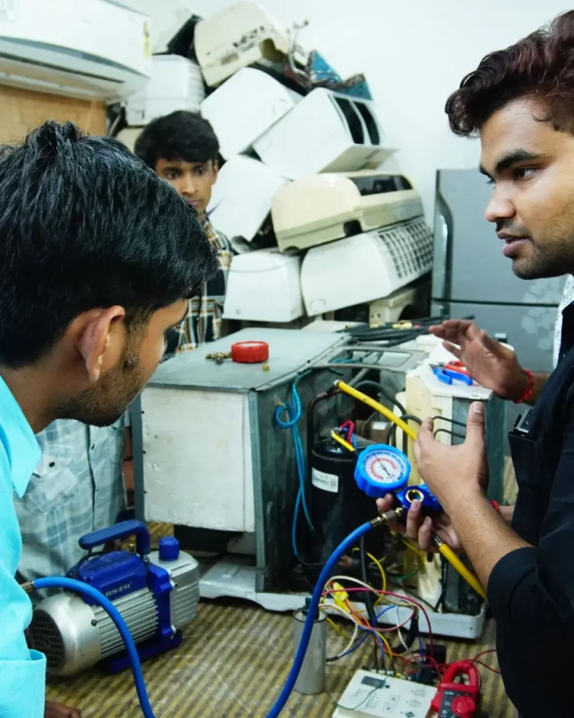 Team of certified technicians servicing an air conditioner